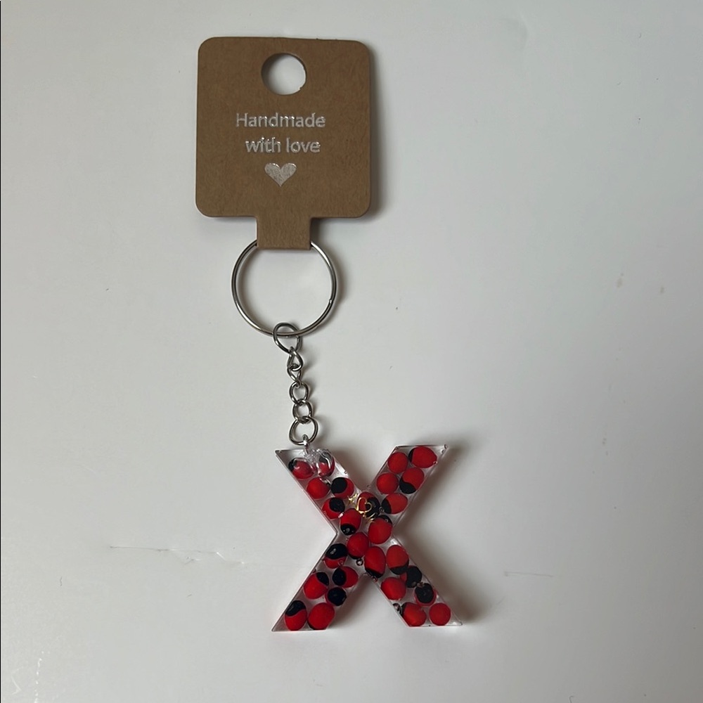Huayruros Handmade keychains. Chakra, Luck, Protection and Prosperity